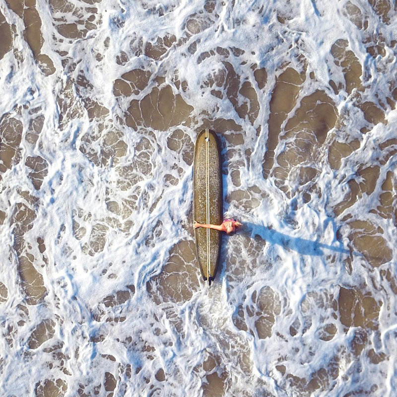 surfboard in sea water - Weligama, SP, Sri Lanka surfboard in sea water - Weligama, SP, Sri Lanka